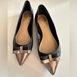 Vince Camuto pointed toe flats.